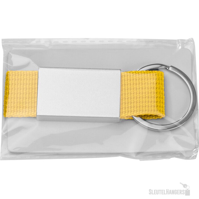 Sleutelhanger van stof en metaal geel