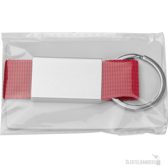 Sleutelhanger van stof en metaal rood