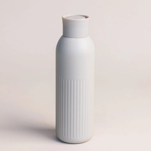 Sagaform Tekla Push stalen fles met druk dop Beige